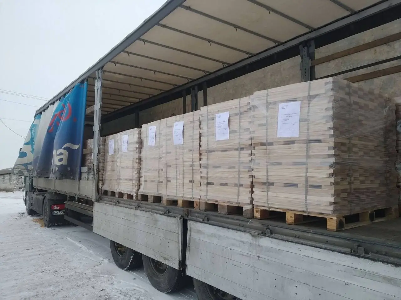 Lumber packs loaded onto a truck